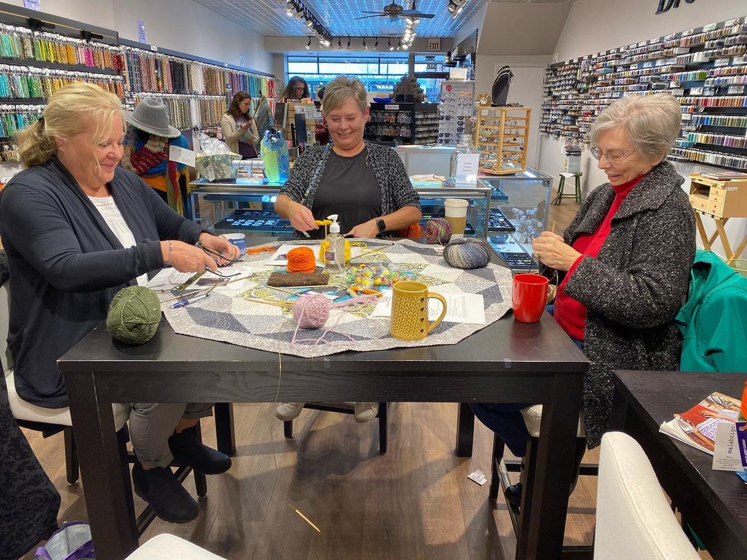 group of ladies enjoying a knitting project at iTry Studios