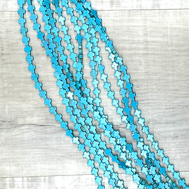 Turq. Magn Cross 8x10mm, 16" strand