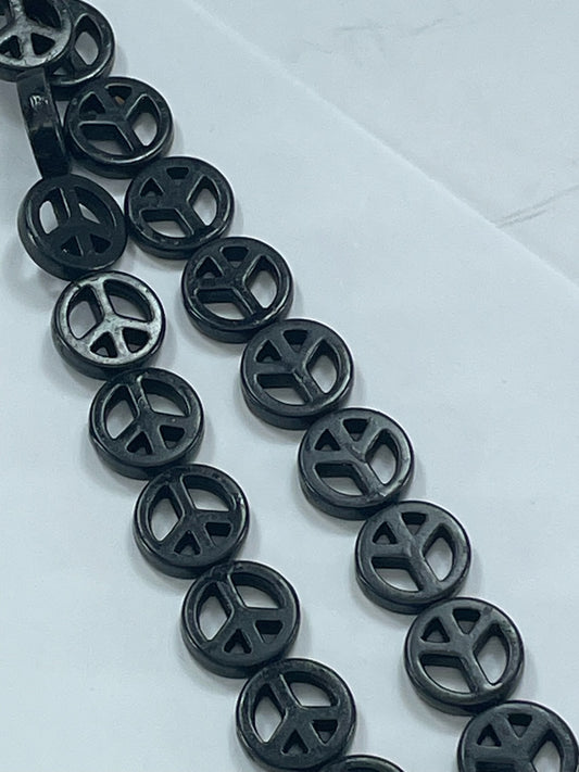 Black Magnesite Peace, 15mm, 16" Strand