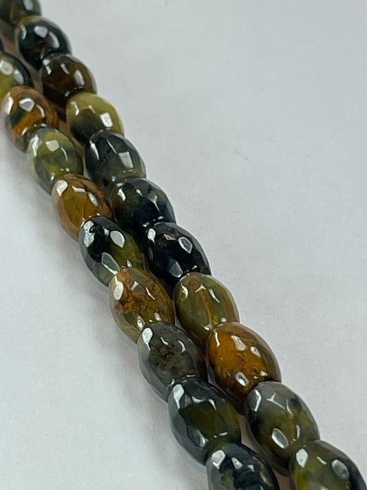 Pietersite Faceted Barrels, 6x9mm, 16" strand